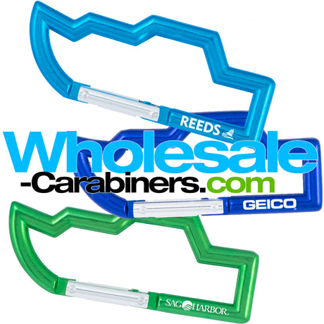 Aluminum engraved carabiners in the shape of a boat, anodized in light blue, dark royal blue, and green.