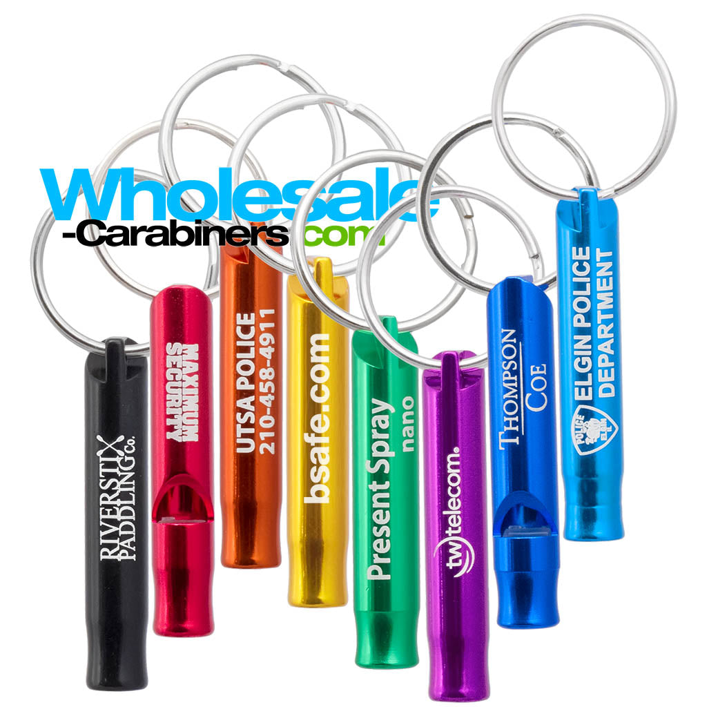 Laser Engraved Key Siren Safety Whistles in Black, Red, Orange, Gold. Green, Purple, Royal Blue and Light Blue against a white background.