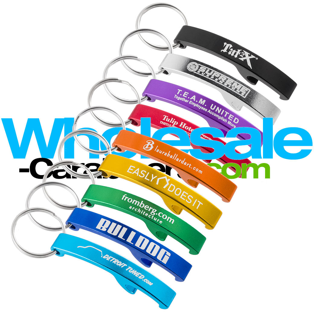 Grouping of nine Lasered Arc custom engraved anodized aluminum bottle openers in light blue, dark royal blue, green, gold, orange, red, silver, purple and black against a white background.