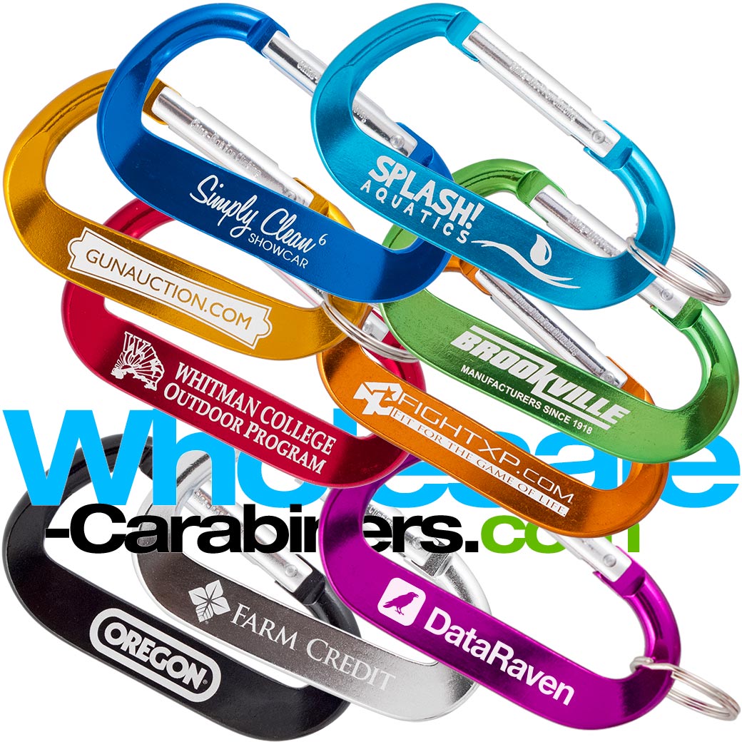 Group shot of nine 3.125" (80mm) engraved anodized aluminum promotional LogoBeener™ carabiners with logos, in colors of light blue, dark blue, green, black, gold, orange, red, purple and silver, arranged against a white background.