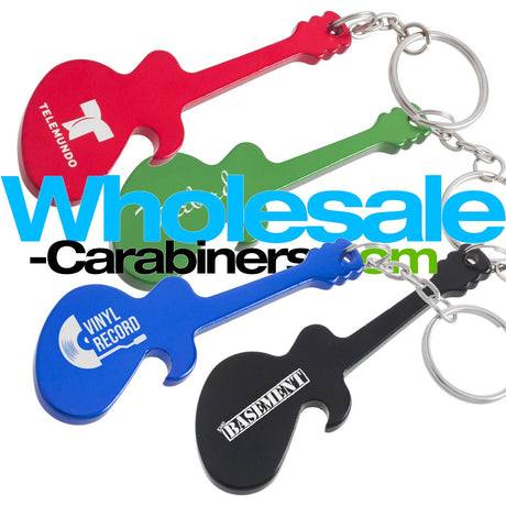 Four guitar-shaped keychains in red, green, blue, and black, each engraved with a different logo, arranged diagonally on a white background with a large 'Wholesale-Carabiners.com' watermark overlay.