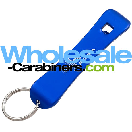 A blue snowboard shaped bottle opener keychain with a silver split ring, shown on a white background with a large 'Wholesale-Carabiners.com' watermark overlay.