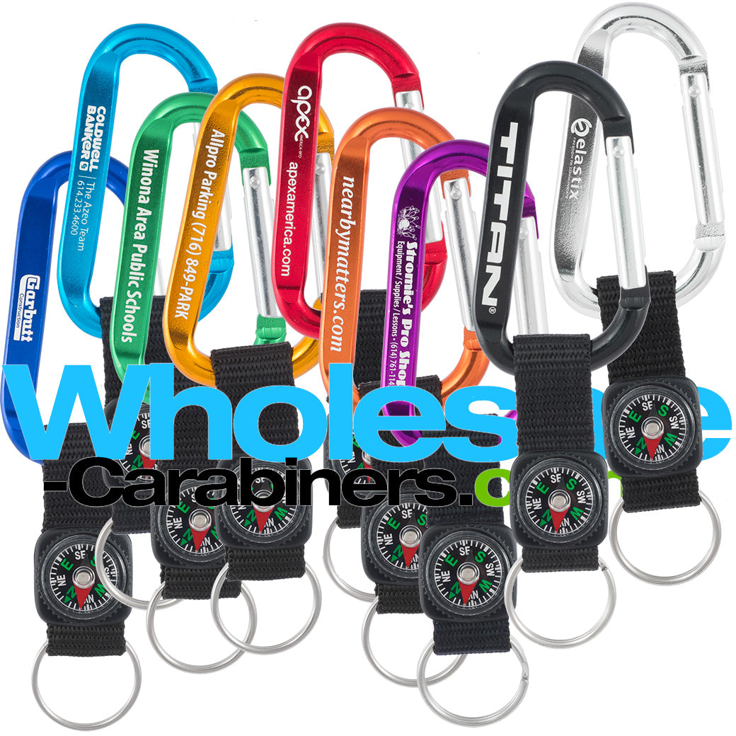 Nine 60mm engraved aluminum carabiners all in different colors, including dark blue, light blue, green, gold, red, orange, purple, black and silver, with attached nylon straps with compasses.