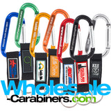 Seven 60mm engraved carabiners all in different colors with attached nylon straps with various customized PVC patches applied.