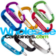 An array of eight 2.75" (70mm) engraved anodized aluminum LogoBeener™ carabiners with logos, in colors of light blue, dark blue, green, black, gold, red,  purple and silver, arranged against a white background.