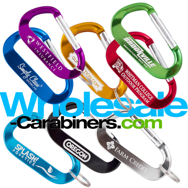 An array of eight 2.75" (70mm) engraved anodized aluminum LogoBeener™ carabiners with logos, in colors of light blue, dark blue, green, black, gold, red,  purple and silver, arranged against a white background.