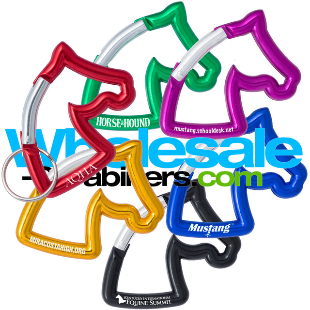 Six aluminum engraved carabiners in the shape of a horse's head, anodized in red, green, purple, gold, dark royal blue, and black.