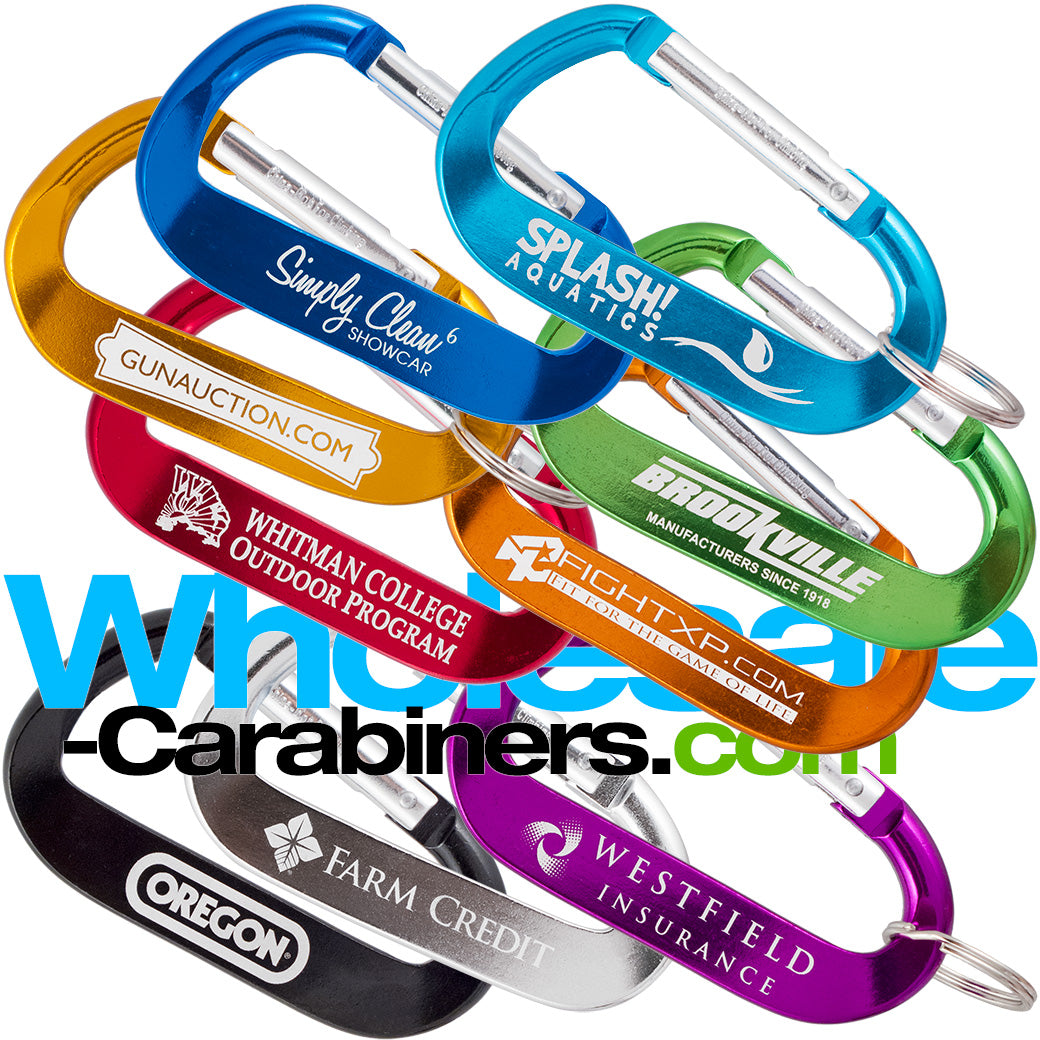 Group shot of nine 3.125" (80mm) engraved anodized aluminum promotional LogoBeener™ carabiners with logos, in colors of light blue, dark blue, green, black, gold, orange, red,  purple and silver, arranged against a white background.